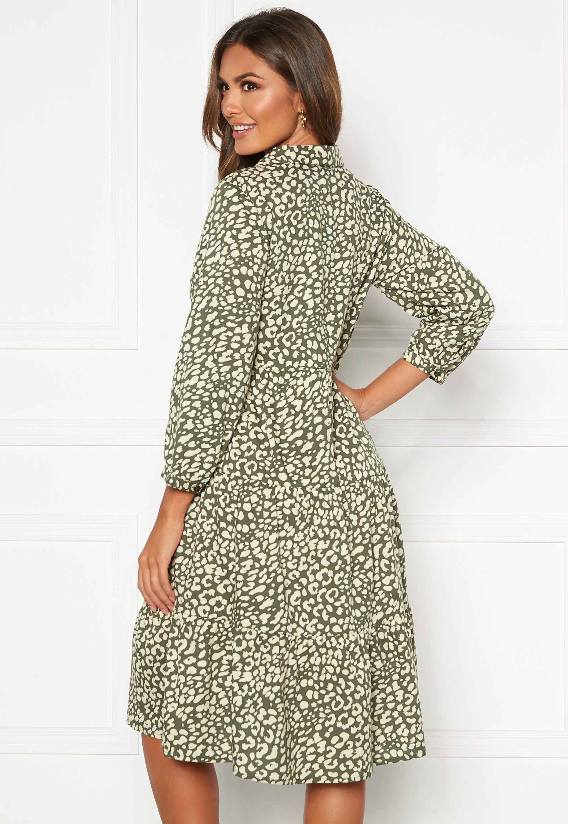 green patterned midi dress